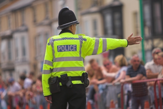 Blue Light - Police officer directing the public